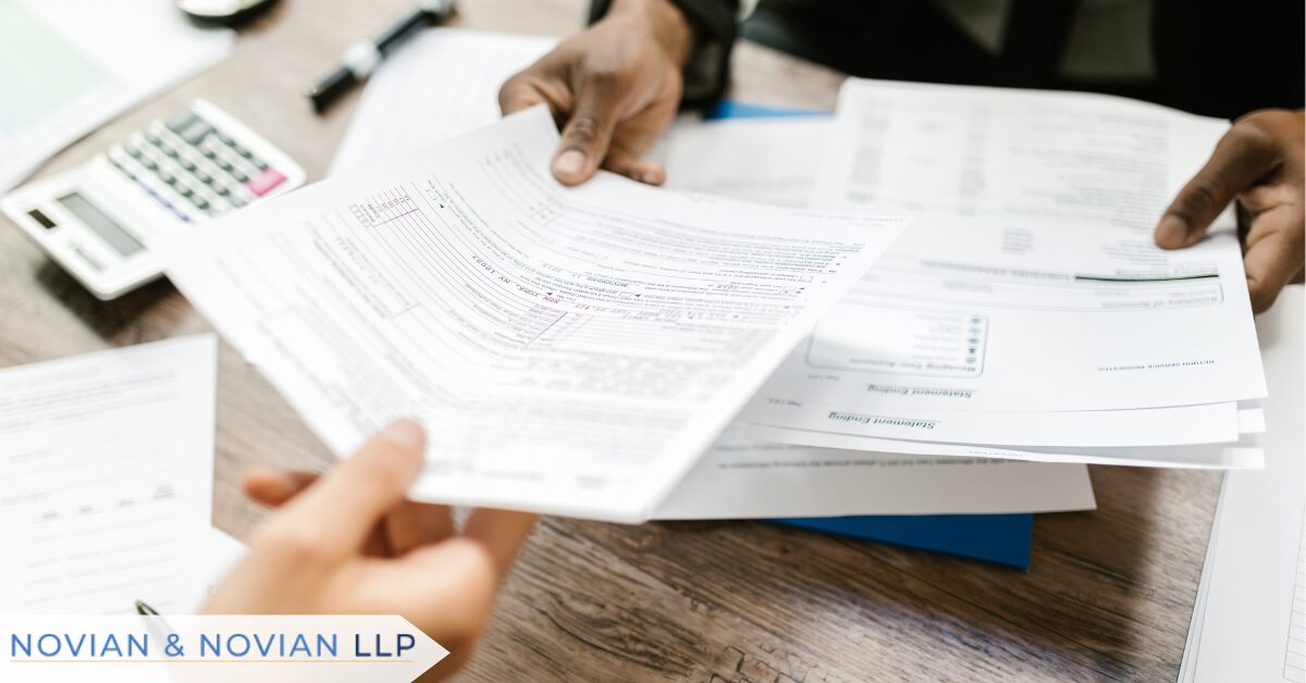 Employer reviewing documents after receiving an EEOC complaint